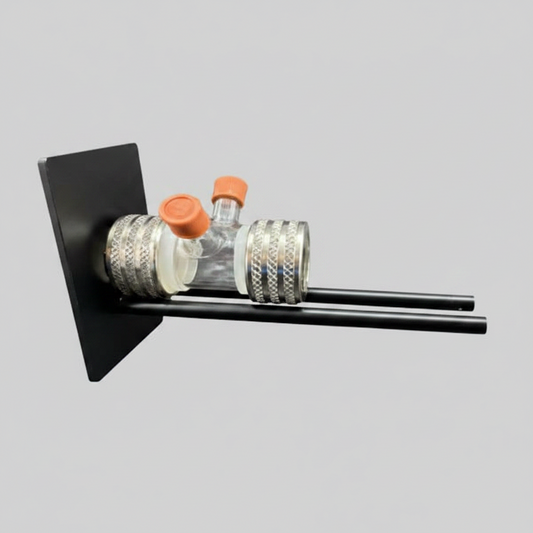 Laboratory setup with a centrifuge tube holder and centrifuge tubes on a black background