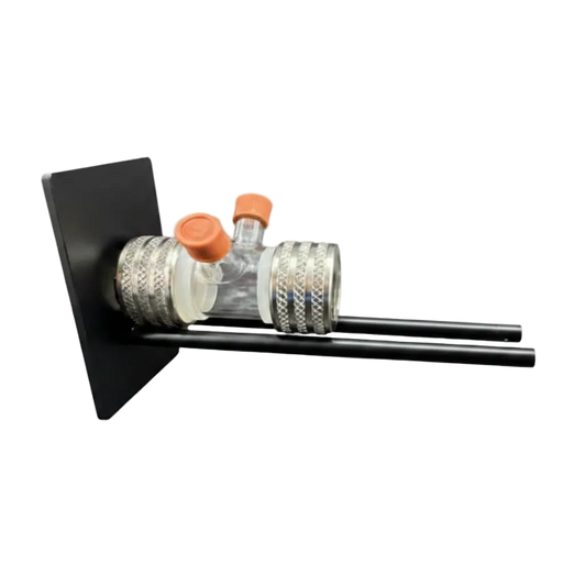 Laboratory setup with a centrifuge tube holder and centrifuge tubes on a black background