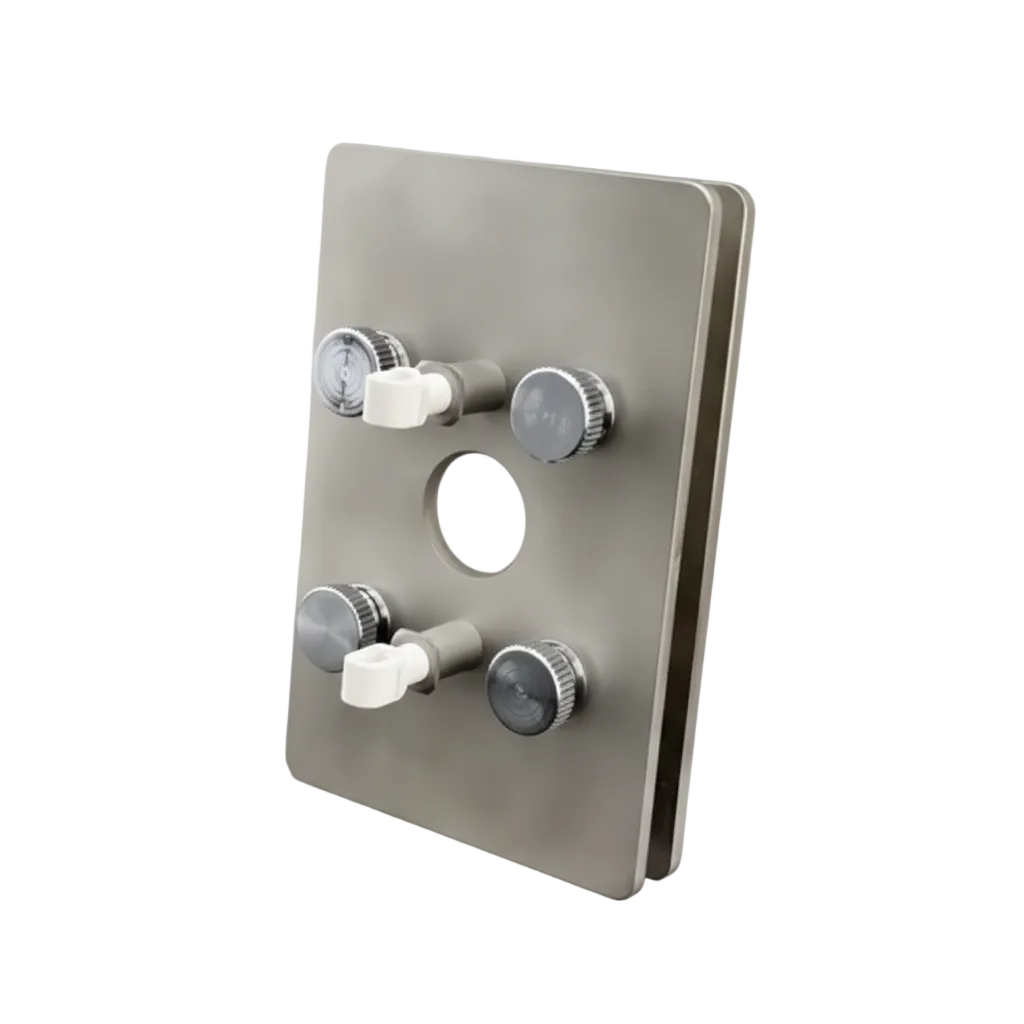 Metallic plate with three knobs on a white background