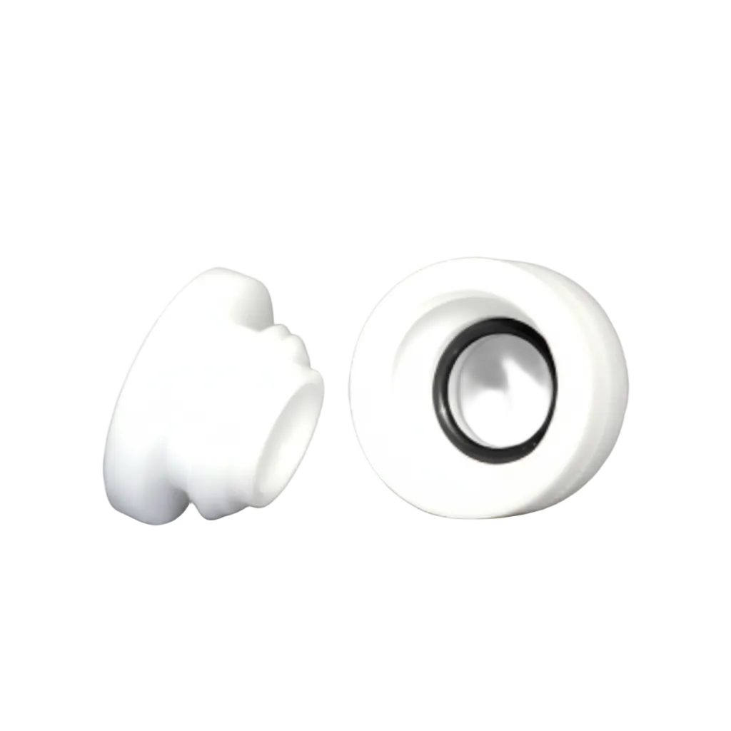 Two white plastic cylindrical components, one upright showing a black inner ring and one lying on its side, on a gray gradient background.