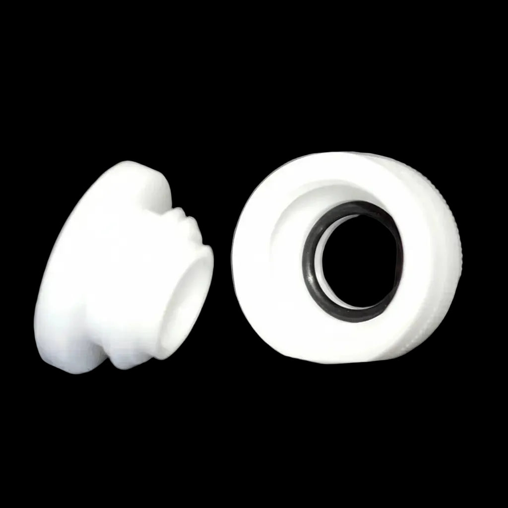 Two small white plastic cylindrical components shown on a black background, one standing upright and one lying on its side to reveal a circular opening with a dark ring inside.