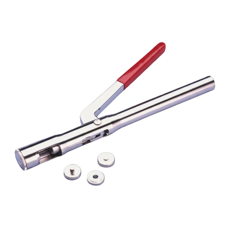 A stainless steel mechanical tool with a red handle, shown on a light gray background with three small white circular accessories.