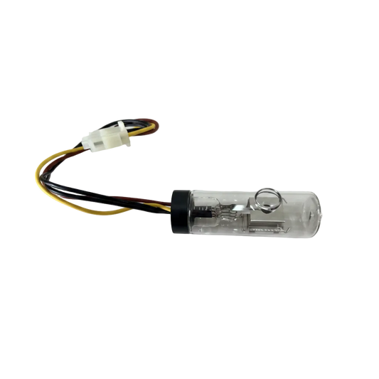A small transparent cylindrical component with a black cap and attached multicolored wires, photographed on a plain light background.